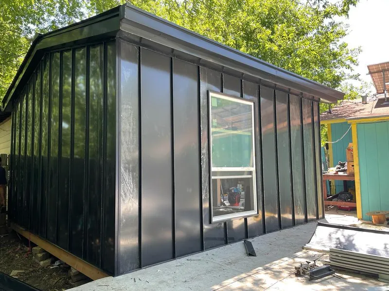 Black standing seam metal wall panels for Roof Inspection in Shelton